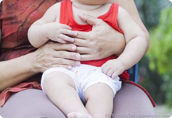 Baby on knee